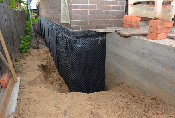 SJ Waterproofing Pros technician performing targeted Waterproofing assessment in Perkiomenville, PA